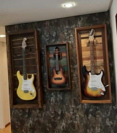 Wall-mounted guitar display cases